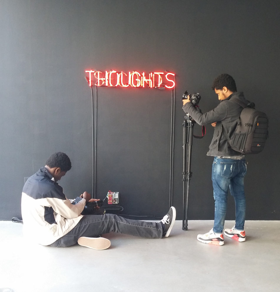 Interpreting interrupting youth, Victor Ilunga (Left) and Birehanu (right) filming Angie Keefer's Second Thoughts, 2017