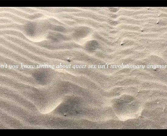 Sand creating ripples from the wind. The text reads: "don't you know writing about queer sex isn't revolutionary anymore?"