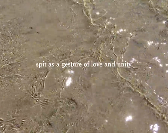 Clear water moving along the shore. The text reads: