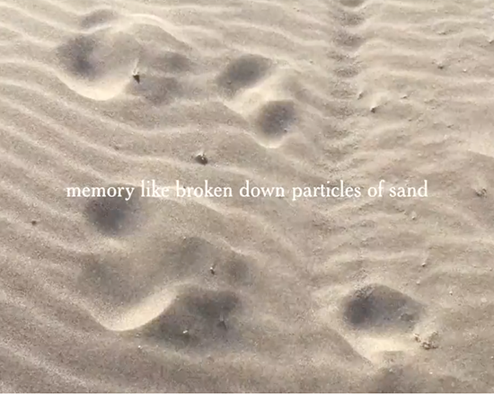 Shot of the sand as it creates ripples from the wind. The text reads: